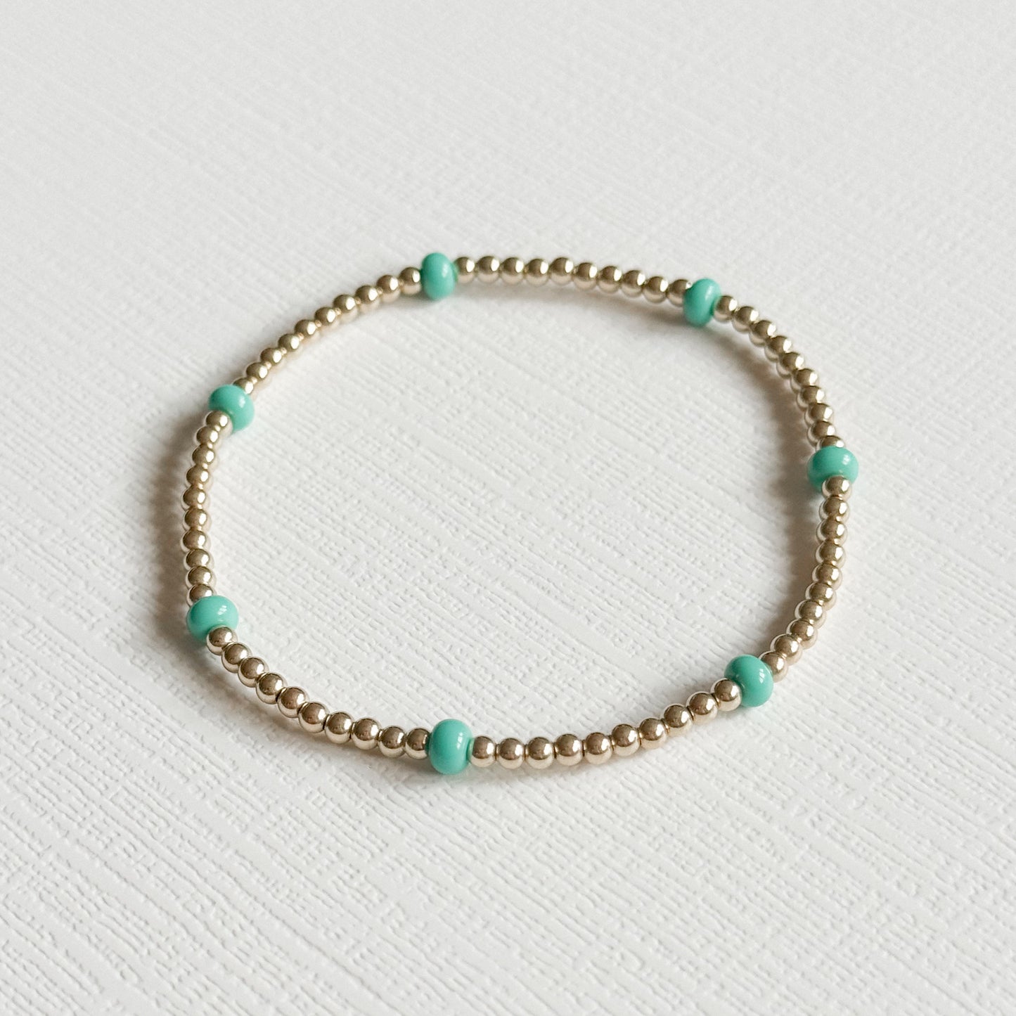 Dainty Aqua Splash Gold Bracelet