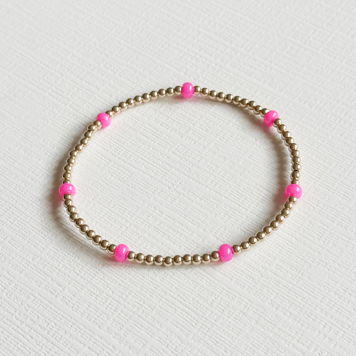 Dainty Hot Pink Splash Gold Bracelet